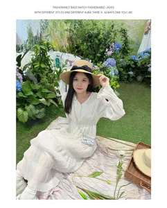 Detailed view of the elegant mini quilted chain crossbody bag in a charming garden picnic setting.