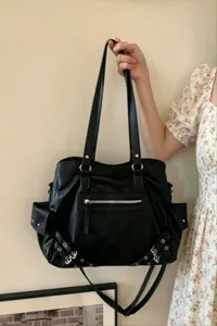 Stylish black leather tote shoulder bag for women, large capacity commute handbag.