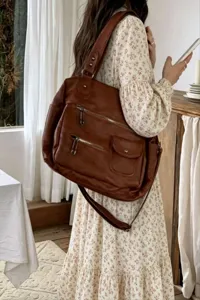 Vintage large capacity PU leather motorcycle crossbody tote bag with multi zippers and pockets.