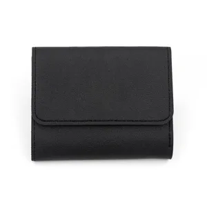 Black short trifold leather wallet detail, compact card holder design with flap closure.