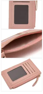 Pink PU leather card holder detail showing clear ID window, card slots, and smooth zipper.