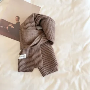 Solid color knit scarf winter warm brown neck warmer casual stylish fashion accessory.