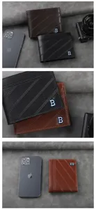 Detail view of vintage men short PU leather wallets with card slots and metal B logo.