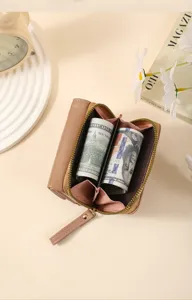 Detail view of a Korean style women short wallet with zip closure, compact coin purse design.