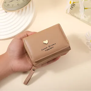 Cute short women wallet with heart charm, stylish PU leather coin purse and card holder for daily use.