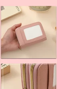 Pink PU leather card holder wallet with zipper and ID window, compact design for daily use.