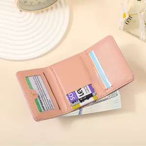 Women short trifold wallet cute pink pu leather card holder coin purse with multiple slots.