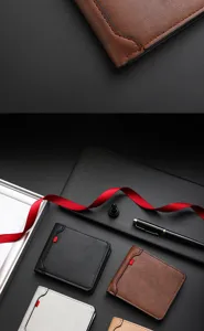 Close-up detail view of minimalist men's short wallet, multi-card slot fine leather.
