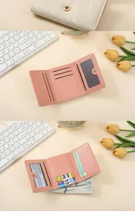 Trifold mini wallet for women, compact pink PU leather card holder with clear ID window.