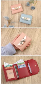 Detailed view of the women's trifold short wallet, featuring cute bowknot and card slots.