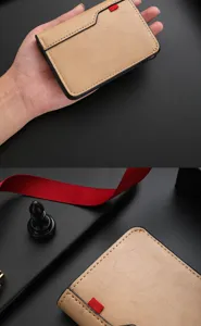 Detailed view of minimalist men's short vertical leather wallet with card slots and tab.