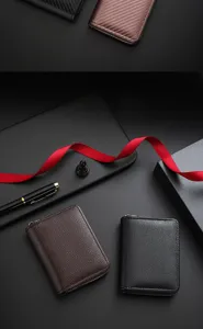 Detail view of stylish men and women short zipper wallets with premium texture and zipper.