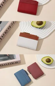 Short women zippered wallet detail view, solid color and contrast design, practical compact coin purse.