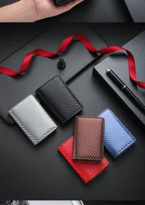 Detail view of men's slim carbon fiber RFID blocking auto popup aluminum card holder wallet.