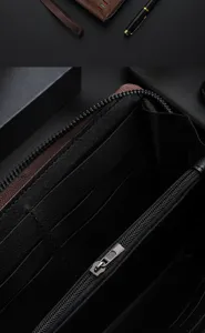 Detailed view of men's long zip wallet interior, showing multi-card slots and coin pocket.