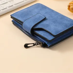 Blue short women wallet with zipper and snap button, premium frosted leather texture.