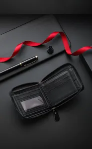 Men's black bifold wallet detail showing multiple card slots, ID window, and zipper pocket.