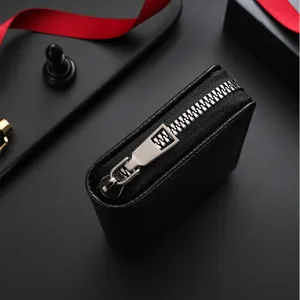 Premium black leather zipper wallet for men and women, compact short coin purse design.
