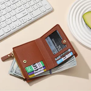 Women short zipper wallet solid color PU leather card holder coin purse with multiple slots.