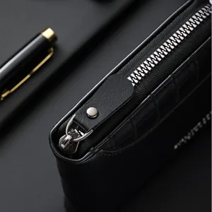 Men's short leather wallet with stone pattern texture, zipper coin purse and card slots.