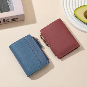 Women's solid color short zipper wallet, minimalist PU leather coin purse card holder.