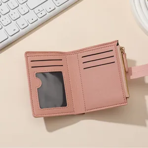 Pink short women wallet with multiple card slots and zipper pocket for daily use and travel.