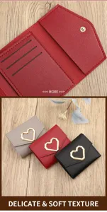 Details of women short trifold wallet with cute heart buckle and card slots on wood background.