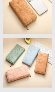 Floral embossed PU long wallet with multi-card slots, zipper closure, and large capacity.
