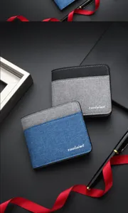 Closeup detail of mens short canvas wallet with contrast color patchwork and card slots design.