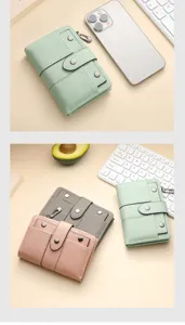 Detailed view of women's short trifold matte leather wallet with snap button and coin pocket.
