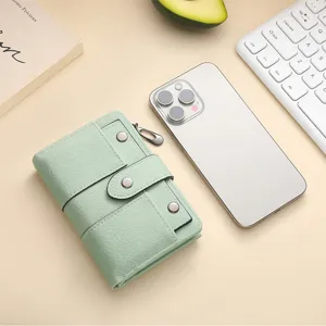 Mint green short tri-fold wallet for women, retro matte PU leather coin purse with rivets.