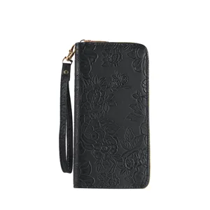 Black PU leather wallet for women, embossed floral long purse with wrist strap and zipper.