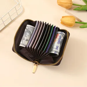Brown zipper card holder wallet for women, compact accordion multi-slot portable coin purse.