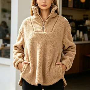 Women half zip sherpa fleece pullover sweater detail view, warm winter cozy casual top.