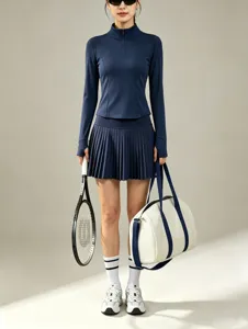 Ensemble haut de tennis à manches longues et jupe plissée vêtements de sport fitness golf.