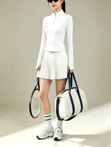 Ensemble haut de tennis à manches longues blanc et jupe plissée pour sport et fitness femme