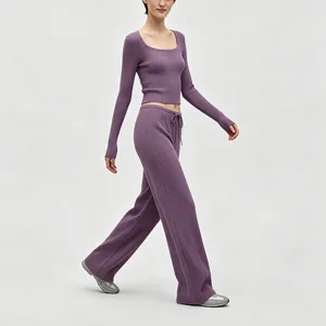 Ribbed knit yoga outfit set with U-neck long sleeve top and wide-leg lounge pants.