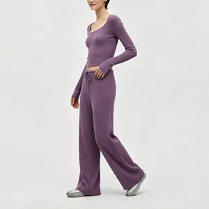 Purple ribbed knit crop top and wide leg pants set, comfortable casual lounge wear outfit.
