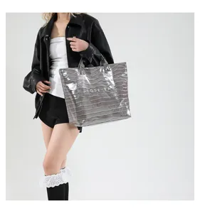 Schicke graue Handtasche mit Krokomuster, große Schultertasche für den täglichen Gebrauch.