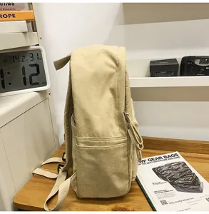Casual μονόχρωμο σακίδιο πλάτης μετακίνησης λεπτομέρεια, ευέλικτη καθημερινή τσάντα σχολείου.
