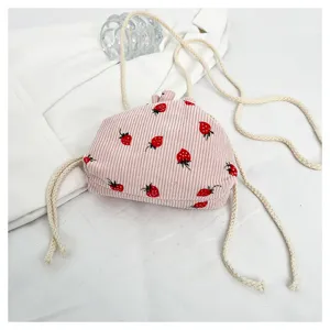 Pink corduroy strawberry print drawstring bucket bag, cute casual single shoulder messenger bag.