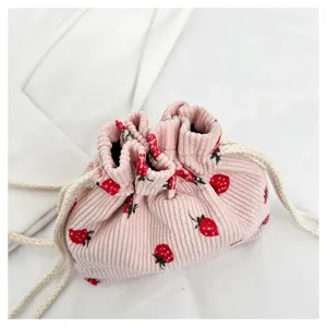 Cute pink corduroy strawberry print drawstring bucket bag, stylish casual women handbag.