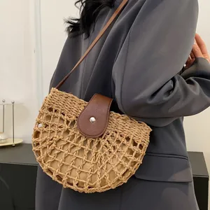 Woven straw shoulder bag for women, summer casual crossbody saddle bag for beach vacation.