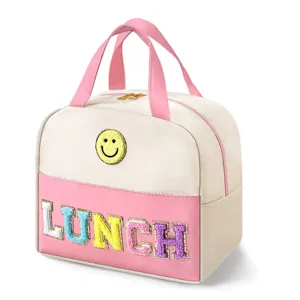 Insulated lunch bag with cute smiley face and colorful letter embroidery for daily use.