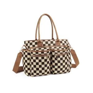 Sac cabas en toile à carreaux avec poignées en cuir marron, grand sac bandoulière élégant.