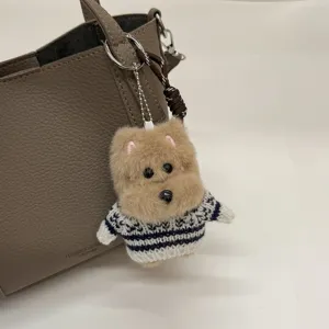 Vintage PU leather bucket bag with cute plush puppy keychain pendant for women daily fashion.