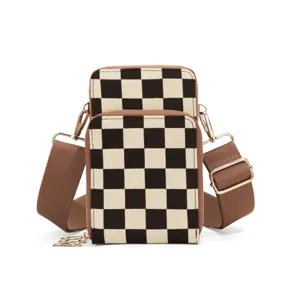 Black and white checkerboard mini crossbody phone bag with wide strap and zippers.
