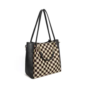 Detailed view of the stylish checkerboard tote bag showcasing premium stitching and textured canvas.