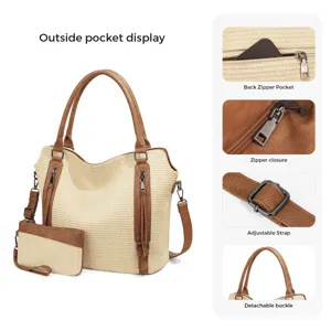 Straw woven tote bag detail showing outer pocket, zipper closure and adjustable shoulder strap