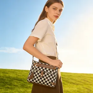 Stylish black and white checkerboard crossbody shoulder bag for women with large capacity.